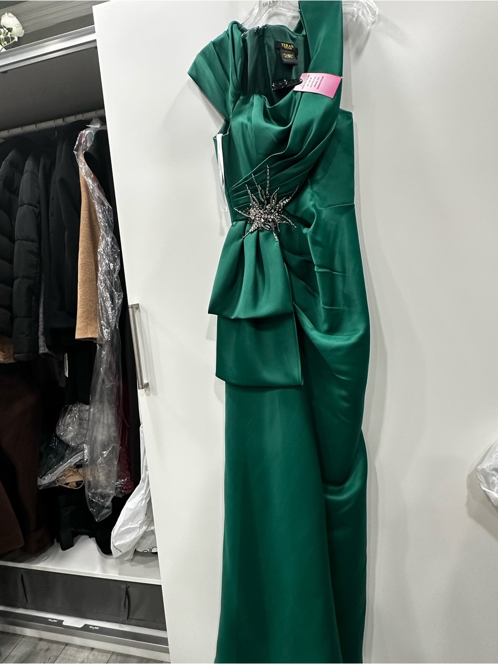 Terani Couture Emerald One-Shoulder Gown with Starburst Brooch